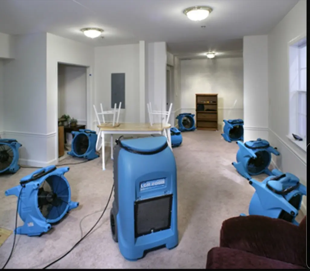 Air movers and dehumidifier setup for Water Damage Restoration in Camano